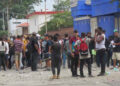 Migrantes latinos se enfrentan contra africanos y haitianos en Tapachula